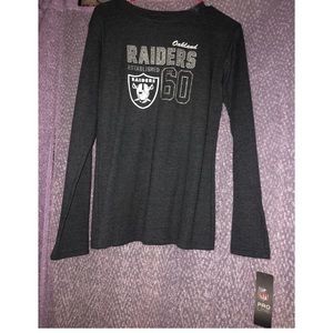 Oakland Raiders shirt.